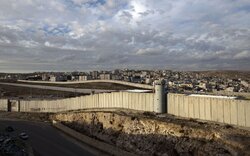 headlineImage.adapt.1460.high.Israel_wall_110513.1447285468870.jpg