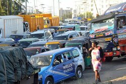 Motorists had to wait for hours to use the ferries.jpg