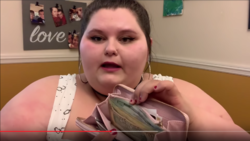 amber uses a prop to describe how gaped her cooch is.png