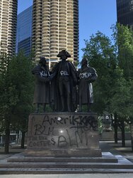 chicago riot statue defaced.jpg