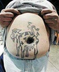 extreme-cow-ass-hole-tattoo-on-belly.jpg