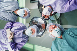 M5500558-Patient_s_eye_view_of_a_surgical_team.jpg