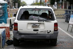 30227188-8475061-Witnesses_had_reported_seeing_a_white_Jeep_SUV_near_one_of_the_m-a-73_1593564...jpg
