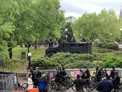 30271442-8480217-Officers_in_riot_gear_issued_a_dispersal_order_at_5am_leading_to-a-51_1593622...jpg