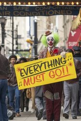 01-joker-with-a-banner-wallpaper-1-325x485.jpg