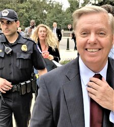Lindsey-Graham-Kavanaugh-Protester-via-Benny-Johnson.jpg
