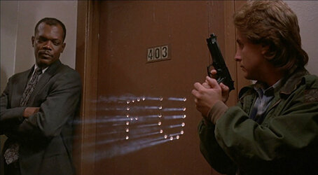 national-lampoons-loaded-weapon-1-movie-review-samuel-l-jackson-emilio-estevez-f-u-door-shooting.jpg
