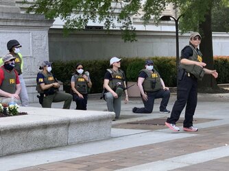 FBI agents kneeling for BLM rioters.jpg
