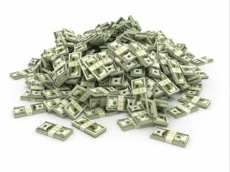 depositphotos_23920645-stock-photo-dollars-pile-from-packs-of.jpg