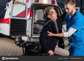 depositphotos_175081132-stock-photo-paramedic-helping-injured-man-sit.jpg