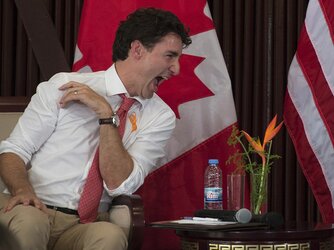 trudeau gay laugh.jpg