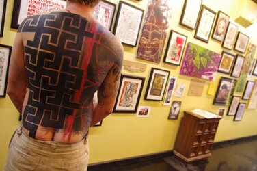 tattoo little swastika 7982789-12419021.jpg