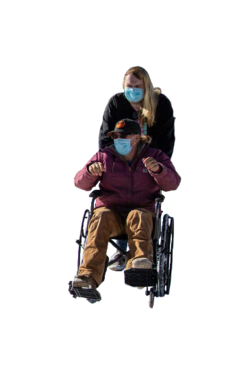 KevinPushingPennyInWheelchair.png