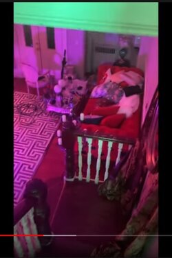 ContraPointsCovid19getawaymansionRedCouch.jpg