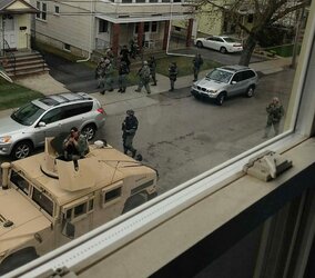 watertown-gun-aimed-at-photogrphaer-923495_10200611106256641_1972215990_n.jpg