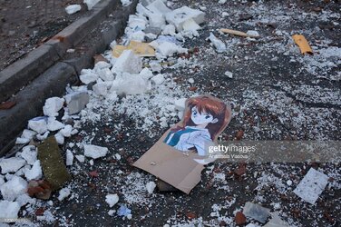 Evangelion-An-illustration-of-Asuka-found-in-the-rubble-in.jpg