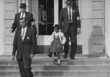 US-deputy-marshals-escort-Ruby-Bridges-from-William-Frantz-Elementary-School-New-Orleans-Novem...jpg