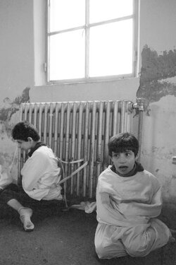 children-tied-to-radiator.jpg
