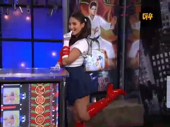olivia_munn_cosplaying_as_sailor_moon_on_attack_of_the_show_sexy_pose.jpeg