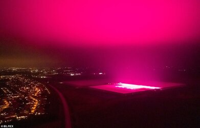 36141058-8990531-TOMATO_SOURCE_The_night_sky_can_be_seen_lit_up_from_the_radiatin-a-49_1606406...jpg