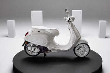 vespa but eggshell white and twice the price.jpg