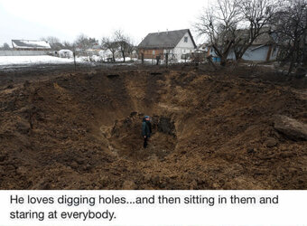 ukraine missile hole copy.jpg
