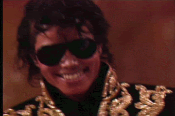 mj-laughing-michael-jackson-13129521-360-240.gif