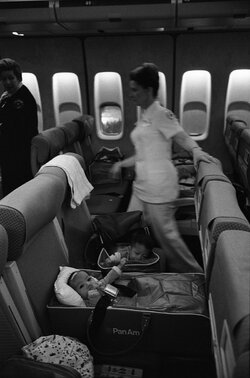 800px-Nurses_and_Vietnamese_Refugee_Children_on_an_Operation_Babylift_Flight_Upon_its_Arrival_...jpg