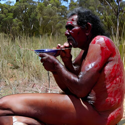 australian-aboriginal-man-drinking-the-blood-of-youths_aQkuiiZP_upscaled.jpg