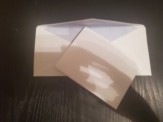 paper about to go into envelope.jpg