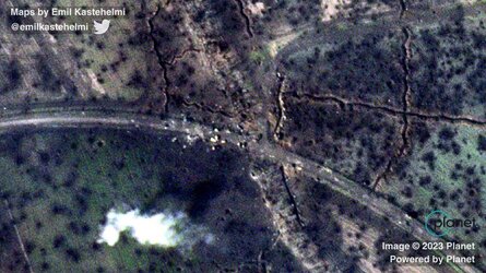 O0506_road_destroyed_vehicles.jpg