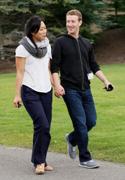 1_Facebook-CEO-Mark-Zuckerberg-walks-with-his-wife-Priscilla-Chan-at-the-annual-Allen-and-Co-...jpeg