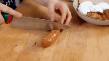 cutting-sausage-emily-kim.gif