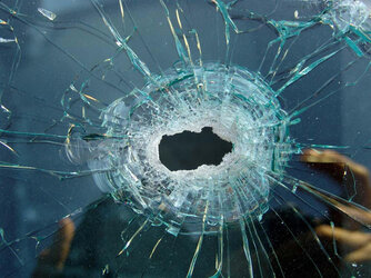 bullet_hole_glass_2_by_stockyard-3481875113.jpg