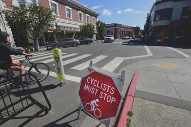 I really hate seeing signs like this treating cyclists like pieces of crap.jpeg