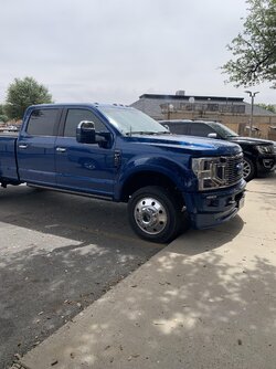 Me, a 22 year old adult in front of an F-450, and Im up on the sidewalk so I have a few more i...jpg