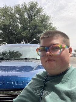 Me, a 22 year old adult in front of an F-450, and Im up on the sidewalk so I have a few more i...jpg