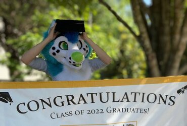 BlueFolf graduation in suit.jpg