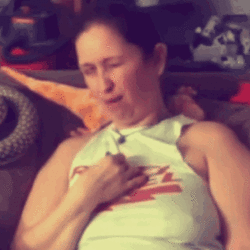 nakedandlaughing-air-guitar.gif