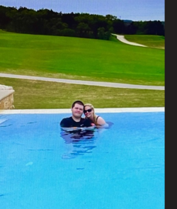 Andy and me in pool.png