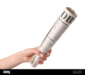 female-hand-and-newspaper-on-white-background-2GEDBRM.jpg