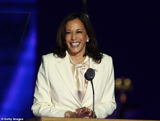 38748690-9211149-Inspiration_She_wore_a_white_suit_identical_to_one_she_wore_at_t-a-21_1612261...jpg