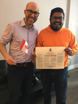 @mikemorrice( holding a Canadian flag ) and me (holding a copy of the Canadian charter of Rights and Freedoms) 