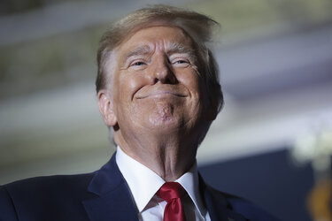 donald-trump-rare-smile-court-pecker.jpg