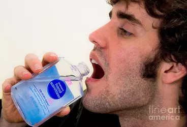 1-drinking-hand-sanitizer-photo-researchers[1].jpg