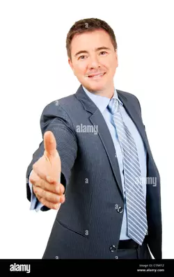 confident-business-man-holding-out-hand-in-friendly-hand-shake-gesture-CTNR12.jpg