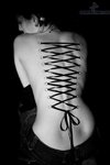 full-back-corset-piercing-with-thick-ribbon.jpg