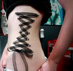 Black-Ribbon-Corset-Piercing-On-Girl-Side-Rib.jpg