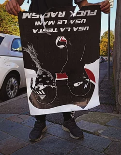Young militants of Rete Studentesca remove anti-fascist posters and banners in front of the Fo...jpg