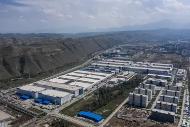 Ironic how one of the largest car factories in the world doesn't have as much parking space as...jpg